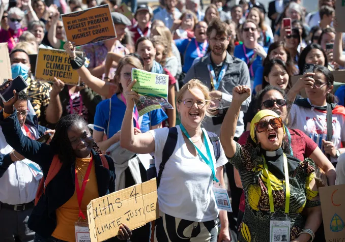 Frédérique Seidel, au centre, lors d’une action en faveur du climat, le 2 septembre 2022, en marge de l’assemblée du COE à Karlsruhe Mike DuBose/COE