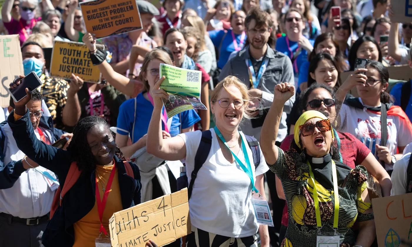 Frédérique Seidel, au centre, lors d’une action en faveur du climat, le 2 septembre 2022, en marge de l’assemblée du COE à Karlsruhe Mike DuBose/COE
